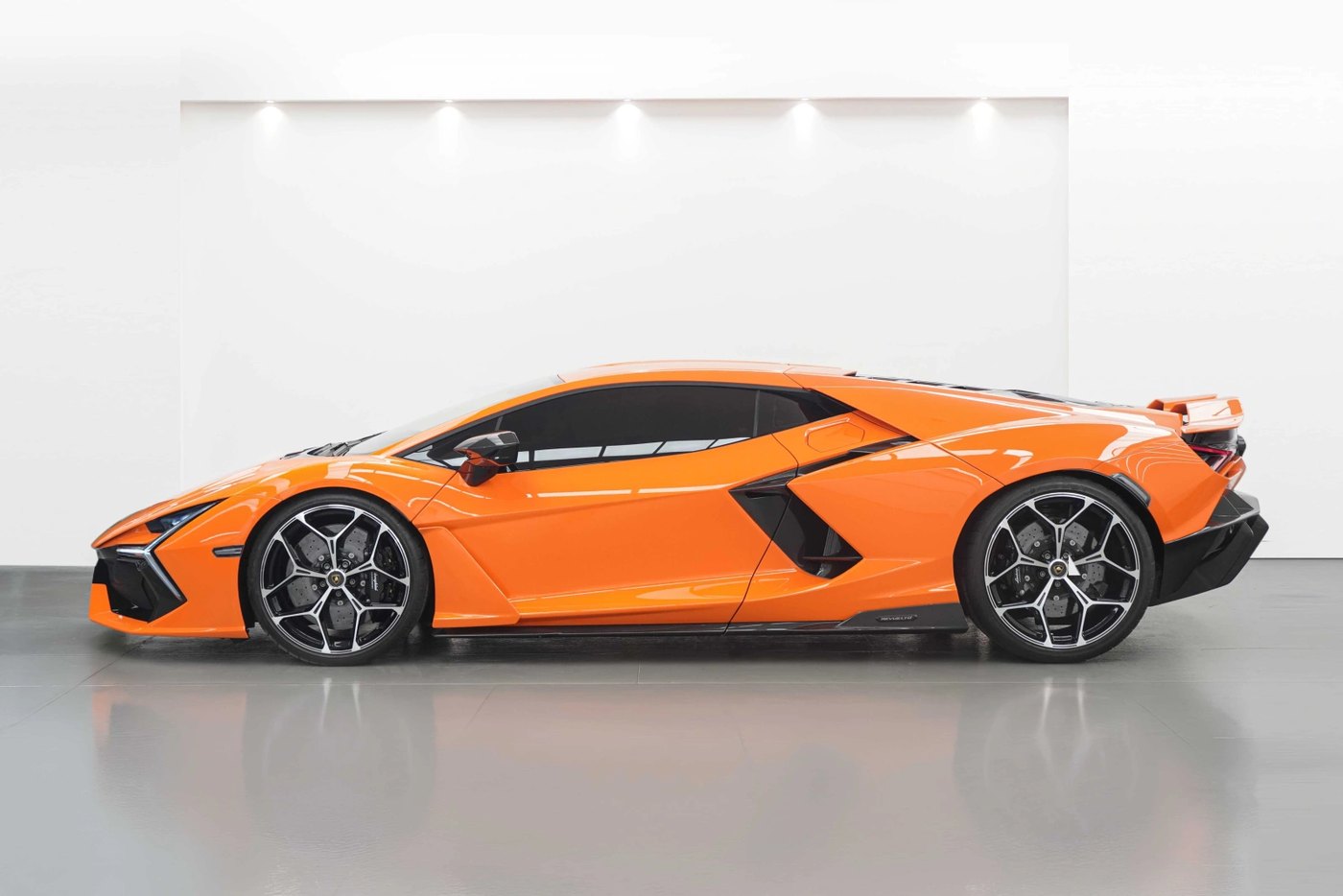 2024 Lamborghini Revuelto Arancio Xanto — side profile